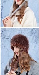 Detailed close-up of fluffy crochet beanies in dark brown and light grey with tassels