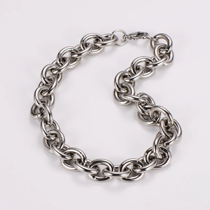 Polished silver stainless steel chain necklace with lobster clasp close-up detail