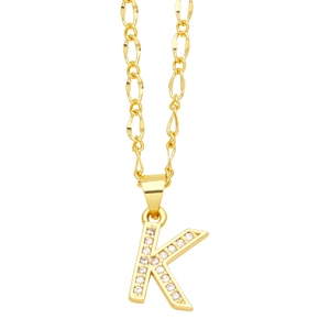 Detail of gold letter K pendant with micro-pave cubic zirconia on a Figaro chain