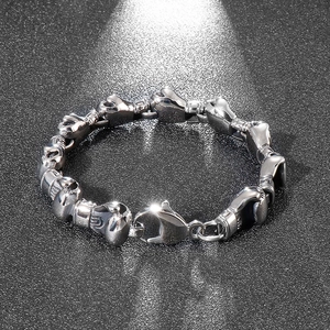 Close-up of hip-hop style silver boxing glove link chain bracelet in durable titanium steel