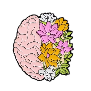 Enamel medical brooch featuring a pink brain and colorful floral lung design