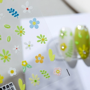Floral spring nail art stickers with colorful petals and leaves on thin adhesive backing