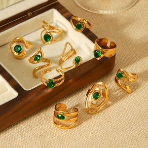 Gold-plated stainless steel ring set with green zircon stones in heart and round shapes