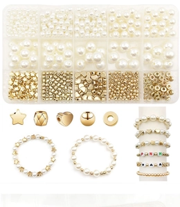Detailed set of white pearls and golden star charms in a 15-compartment storage box