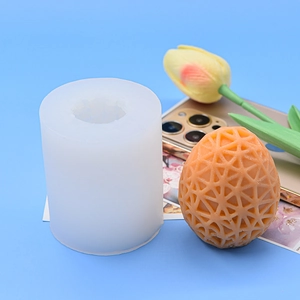 Detail view of Easter egg silicone mold with geometric mesh texture for candle DIY