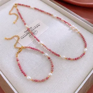 Elegant pink bead and freshwater pearl necklace set with golden clasp and extender chain