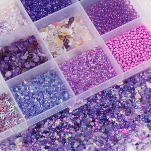 Purple DIY jewelry kit with 12 grids of sequins, crushed stones, and faux pearls