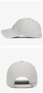 Detail of light grey mesh baseball cap with MK embroidery and metal buckle back strap