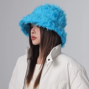 Detail view of the plush bright blue faux fur bucket hat with soft winter texture