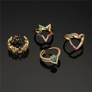 Set of gold-plated star and heart geometric open rings with sparkling cubic zirconia