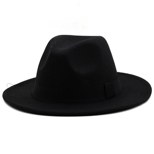 Detailed view of the black wool fedora hat featuring a square silk ribbon and flat brim