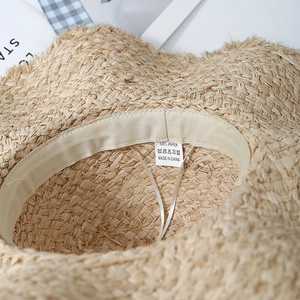 Handcrafted 100% paper raffia sun hat featuring an inner sweatband and quality stitching