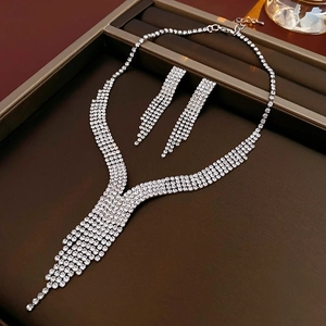 Luxurious water drop tassel necklace and earrings set with shimmering crystals