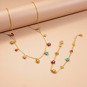 Colorful zircon ladybug and flower pendant necklace with matching gold bracelet