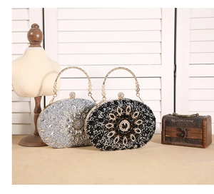 Detailed comparison of silver and black floral rhinestone evening clutch bags with handles