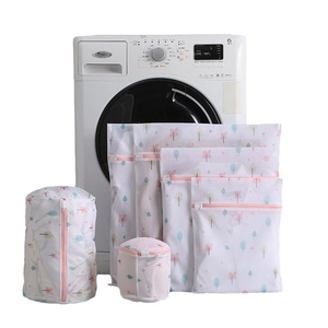 Mesh laundry bags set with colorful tree prints and pink zippers for washing machine