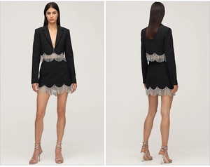 Detail of black two-piece suit set with sparkling silver rhinestone fringe tassels