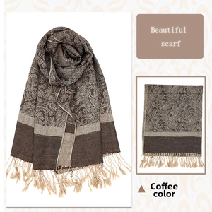 Detailed close-up of coffee brown luxury jacquard shawl with elegant baroque patterns and fringe