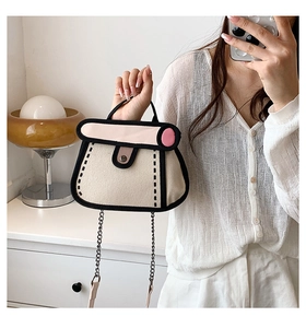 Detail of 2D cartoon style canvas crossbody bag with pink flap and black outlined edges