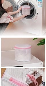 Detail of laundry mesh bag with pink zipper and internal frame for bra protection