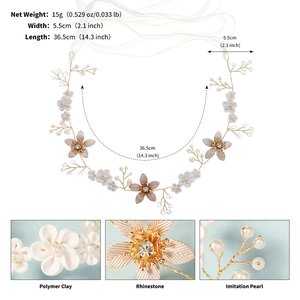 Detail of floral hair vine with white clay flowers, gold leaves, and pearls 36.5cm