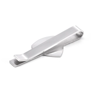 Sleek silver stainless steel men's tie clip with brushed finish and shield emblem
