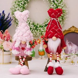 Detail of seated Valentine gnomes with sequined hats and beaded dangling legs