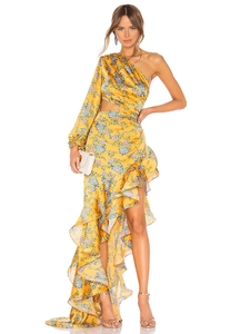 Detail of yellow floral dress with one-shoulder design and ruffled asymmetrical hemline