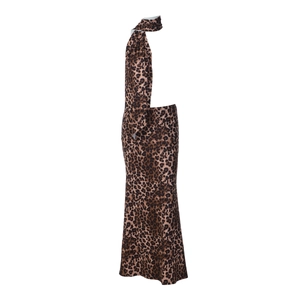 Detail shot of slim-fit leopard print skirt showing textured knit fabric and pattern