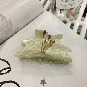 Pale green acetate lily flower hair claw clip with pearlescent marble texture