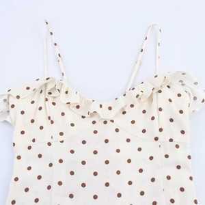 Chic beige midi dress with coffee polka dots featuring thin straps and ruffle neckline