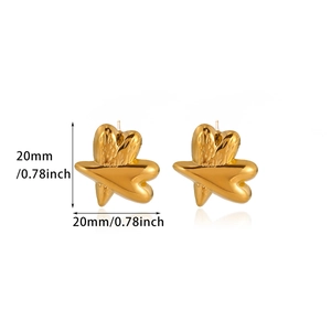 Detailed close-up showing 20mm golden heart and star earrings with embossed metal texture