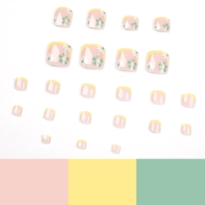 French tip toe nails with yellow borders and white daisy floral patterns on pink base