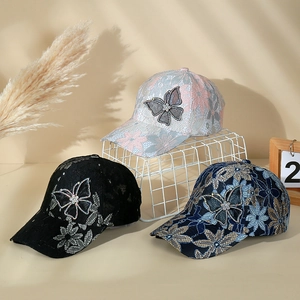 Lace embroidery baseball cap with butterfly rhinestone detail in multi-color display