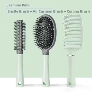 Three-piece mint green hairbrush set including vent brush, cushion brush, and round brush