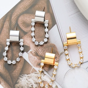 Minimalist geometric round earrings with micro-inlaid zircons in gold and silver finish