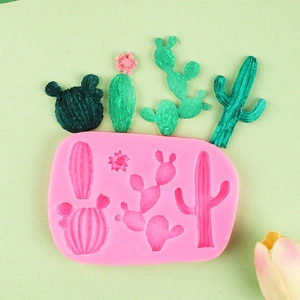 Pink cactus silicone mold with multiple cavities and 3D finished cactus cake toppers