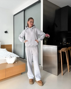 Detailed full-body view of grey hooded sweatshirt and wide-leg jogger set for women