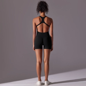 Close-up of seamless backless yoga jumpsuit showing racerback design and compression fabric