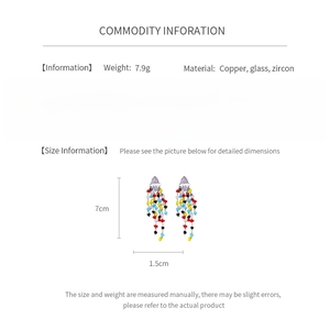 Detail view of rhombic zircon earrings showing dimensions of 7cm height and 1.5cm width