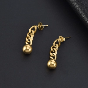 Modern chunky chain drop earrings with polished gold ball pendants on a black leather base