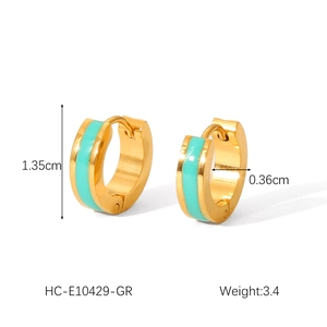 Detail view of 18K gold plated earrings with mint green enamel and 1.35cm diameter