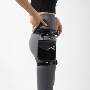 Mini black patent leather leg bag with adjustable straps for fitness and fashion