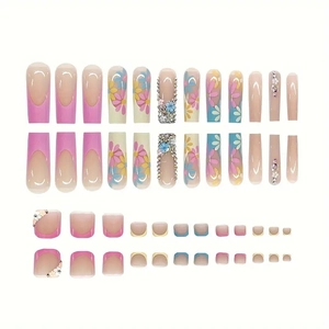 Pink French style press-on nails with yellow and blue flower patterns and rhinestones