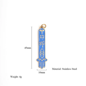 Gold stainless steel Hamsa pendant with blue enamel devil eye detailing and size specs