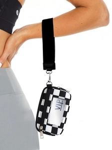 Wristlet pouch featuring black and white checkerboard pattern with clear ID window