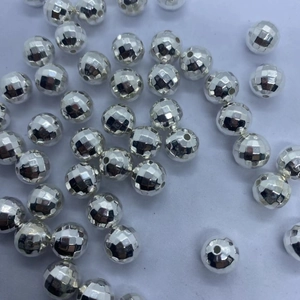 Detailed view of faceted silver plated spacer beads for jewelry making and DIY crafts