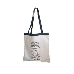 Minimalist white canvas tote bag with black straps and cute panda lucky lucky embroidery
