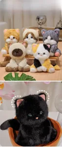 Close-up of soft long-haired plush cats in sitting poses with realistic textures