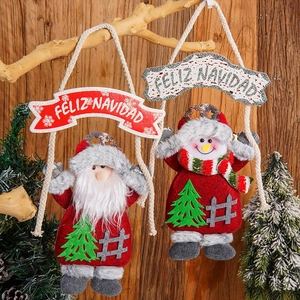 Christmas hanging ornaments set with Santa and Snowman figures on wooden background
